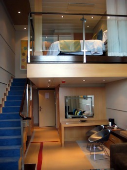 Accommodation includes the more expensive staterooms that span two decks and feature floor-to-ceiling windows with ...