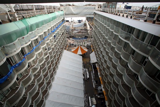The ship is 360 metres long and 65 metres wide, with capacity for 6300 passengers and 2165 crew.