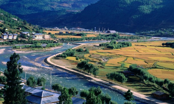 Paro Airport, Bhutan. Tucked into a tightly cropped valley and surrounded by 4900-metre-high Himalayan peaks, Bhutan's ...