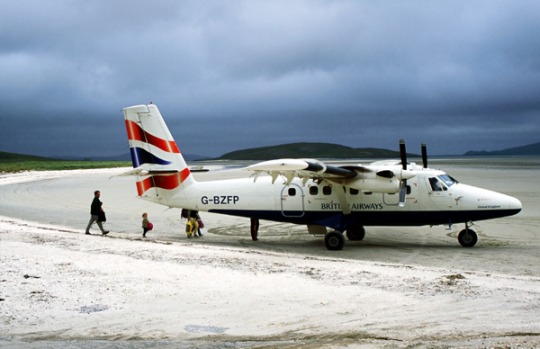 Barra Airport, Scotland. The airport on the tiny Outer Hebridean Island of Barra is actually a wide shallow bay onto ...