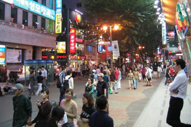 A night time street scene in the Korean capital of Seoul.