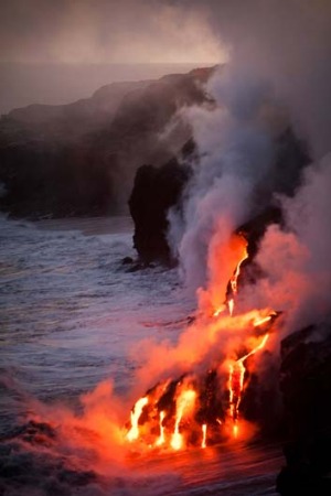 The Puu Oo cone of Kilauea Volcano in Hawaii, one of the few places in the world you can see lava flowing into the ocean.