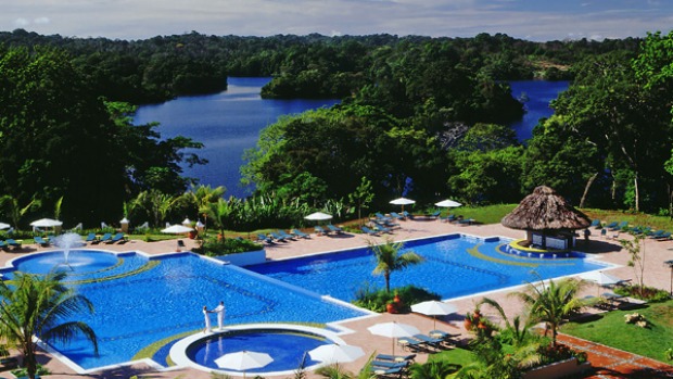 Water torture ... beyond the hotel pool lies dense jungle.