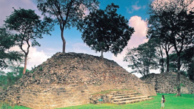 Lone tourist ... the temple ruins in the remote south of Belize attract few sightseers and even fewer tourism dollars.