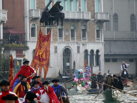 Pianist Paolo Zanarella appears to hover with the help of a crane as he performs during one of the highlights of the ...