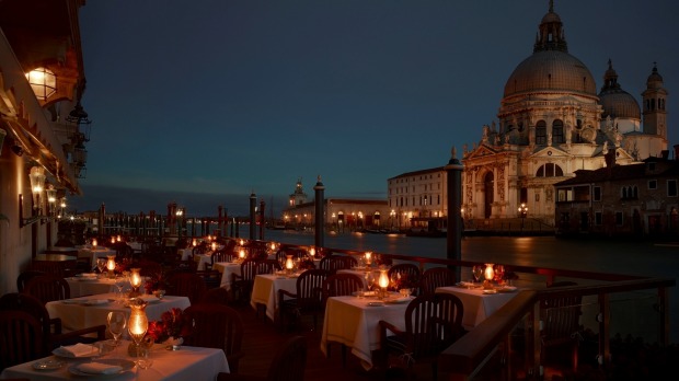 One of the best waterfront eateries: Club del Doge, Venice, Italy. Decor like Casanova's boudoir, terrace right on the ...