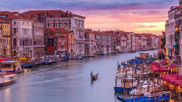 Don't just watch the boats go by in Venice; try steering your own water craft.