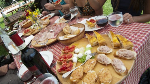 Tables groaning with home-grown produce feed appetites made sharp by sunshine and hill work.