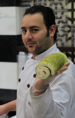 Even watching the chef prepare Syrian ice-cream, or booza, at Damascus Sweets is an experience.