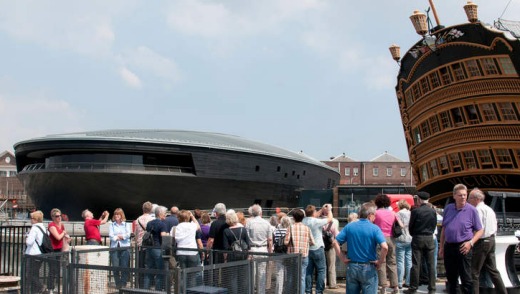 The new Mary Rose Exhibition Hall alongside HMS Victory in Portsmouth, England.