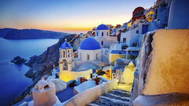 The village of Oia on Santorini island, at dusk.