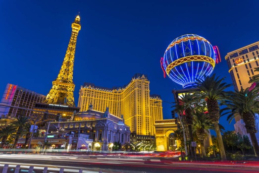 Paris hotel on Las Vegas Strip at twilight.