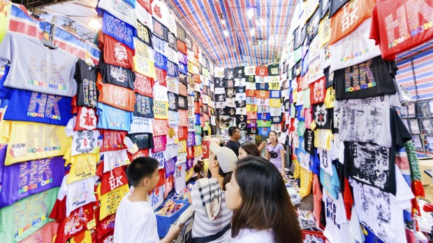 You'll find cheap knock-offs and souvenirs in the buzz at the Temple Street Night Market.