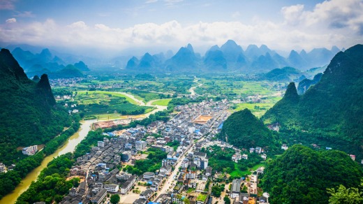 Xingping, Guangxi, China at Li River with karst mountain landscape.