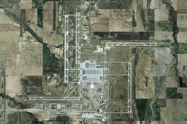 Aerial map of Denver International Airport: Conspiracy theorists ask why the runways form the shape of a swastika?