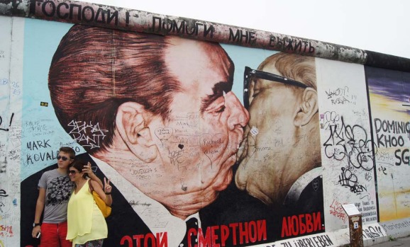 The famous kiss painting on the East Side Gallery is one of the most popular works on the Berlin Wall. It features East ...