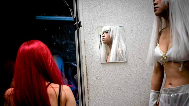 Performers wait backstage prior to the start of a show at The Robot Restaurant in Tokyo, Japan.