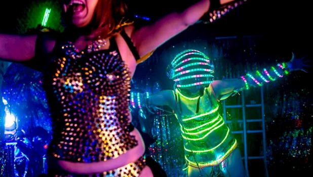 Dancers dressed as futuristic characters perform during a show at The Robot Restaurant  in Tokyo, Japan.