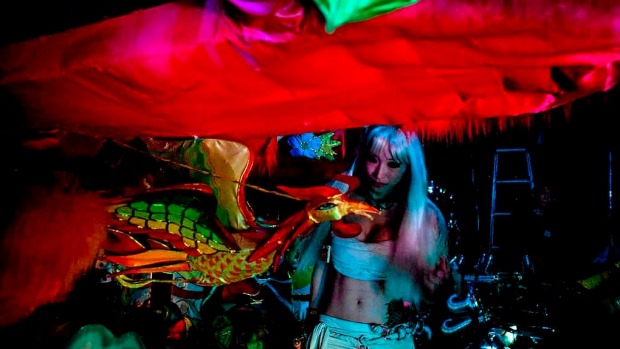 A dancer waits backstage prior to the start of a show at The Robot Restaurant in Tokyo, Japan.