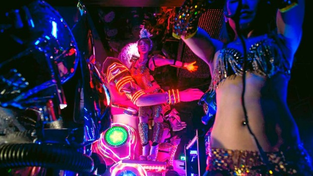 Dancers perform on large scale female robots during a show at The Robot Restaurant in Tokyo, Japan.