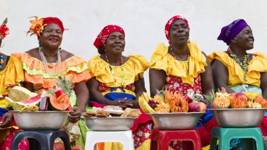 Woman selling fruit in Colombia.