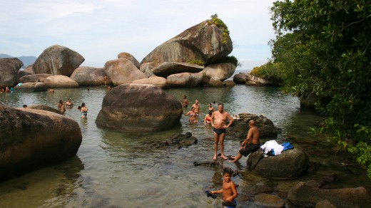 Visitors walk through Atlantic forest to Trindade's beautiful sea pools.