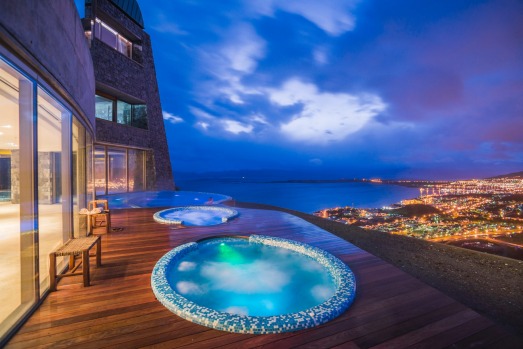 Outdoor jacuzzi at night, Hotel Arakur Ushuaia Resort and Spa, Ushuaia, Tierra del Fuego, Patagonia, Argentina