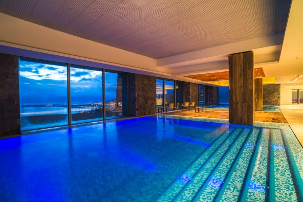 The indoor swimming pool at night.