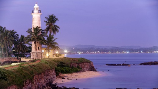 A man hurls himself from a cliff near Galle.