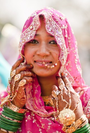 An elegantly decorated and dressed Indian bride.