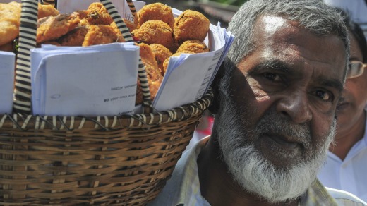 Market vendors selling produce in Hikkaduwa, Sri Lanka.