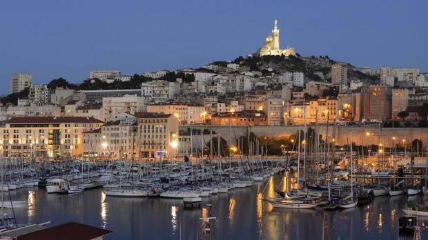 Marseille harbor with its famous Notre Dame church, France.