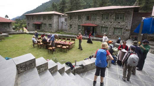 Trekkers arrive at Phakding Lodge.