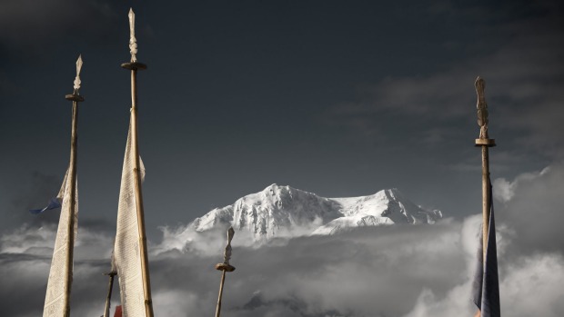 High point: Prayer flags frame the Kanchenjunga peak.
