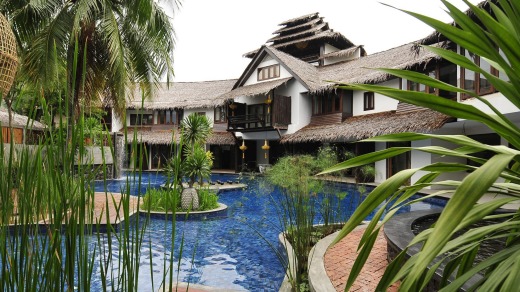 Rooms overlooking the lagoon-like pool at Villa Samadhi, Kuala Lumpur, Malaysia.