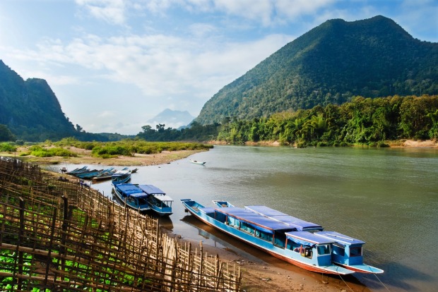 LUANG PRABANG, LAOS: Luang Prabang​ can sometimes look just like any south-east Asian city: it's chaotic, a wild mix of ...