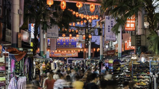 Kuala Lumpur's Chinatown night market busy with shoppers.