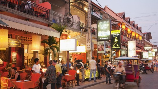 Restaurants on Pub Street, Siem Reap, offer a welcome cheap meal and cold beer after a day's cycling.