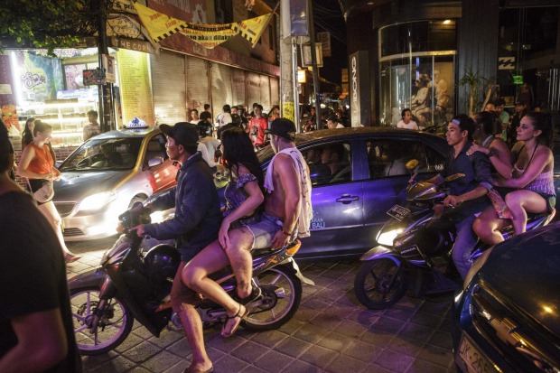 You don't need to wear a helmet, but you'd be mad not to: Lots of tourists hire motorbikes and drive around without ...