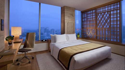A bedroom suite at Oasia Hotel, Singapore