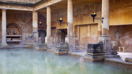 Steam rising off the hot mineral water in the Great Bath, the main pool of the Roman Baths.