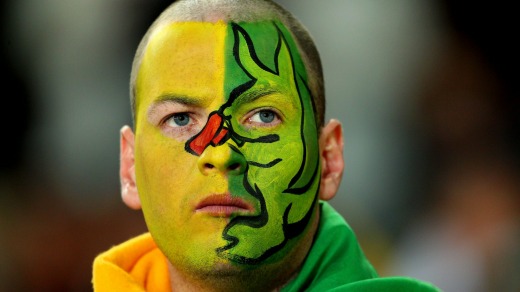 A Wallaby fan has his warpaint on.