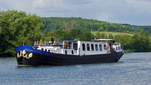 European Waterway's barge Magna Carta on the Thames in England.