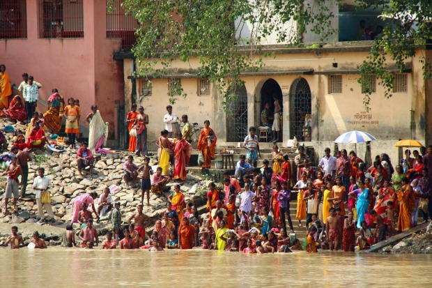 Villagers on the banks of the Ganges River, India.