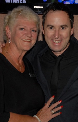 Cruiseaholic: Cheryl Debenham with singer Damien Leith.