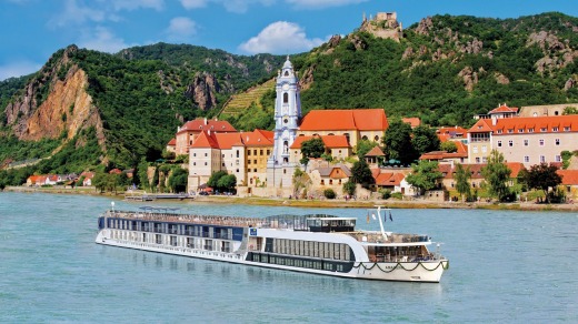 An APT ship sailing past Durnstein on the Danube.