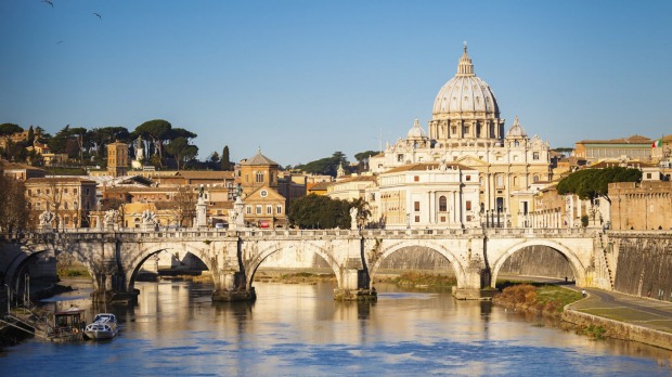 View at Tiber and St. Peter's cathedral in Rome.