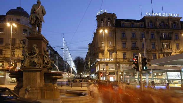 Switzerland, Zurich, view from railway station at Bahnhofstrasse at twilight.