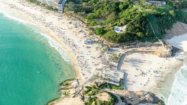 Perfect: Sitting on the rocks at the eastern end of Rio's Ipanema beach.