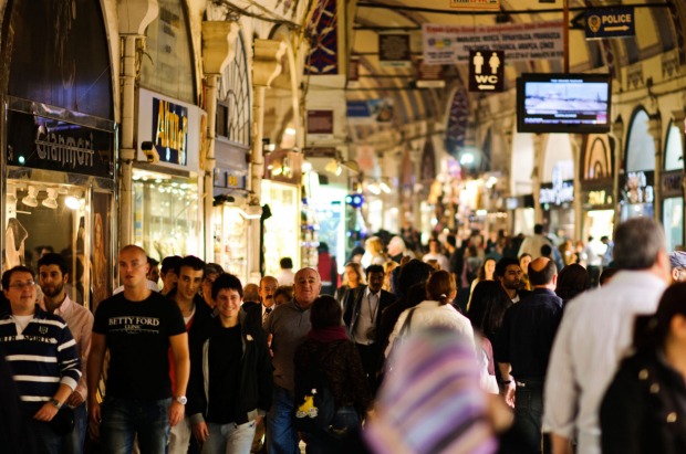 A busy central street of Istanbul's historic Grand Bazaar, all of which is indoors.